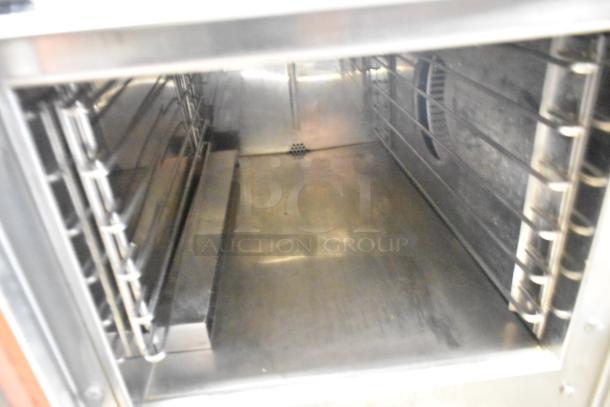 Groen HY-3E steamer interior, stainless steel, single deck, electric, 240V, 3 phase, clean condition, with shelving rails.