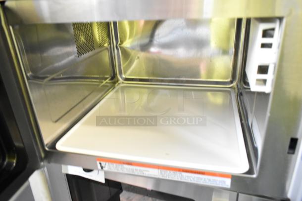 Brand new Solwave 180MW1000SS stainless steel commercial microwave interior, showing push button controls. 120V, 1 Phase.