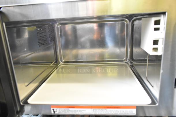 Stainless steel interior of Solwave 180MW1000SS commercial microwave. New with minor blemishes. Push button controls, 120V, 1 Phase.