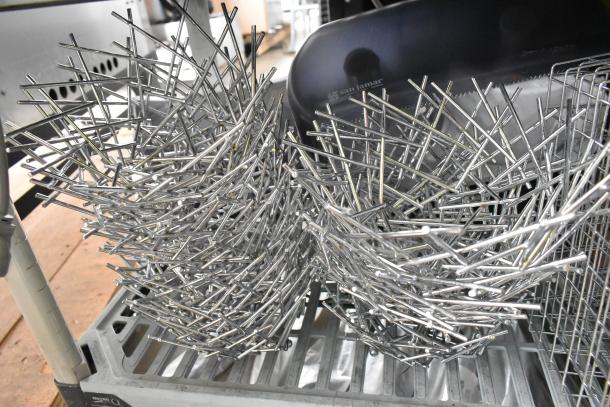 25 assorted metal baskets with intricate wire design, displayed stacked. Excellent condition. Sale includes all pieces.