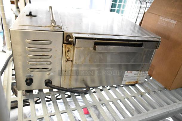 Avantco 177QS1800SS stainless steel countertop steamer, 120V, 1 phase; visible wear and rust.