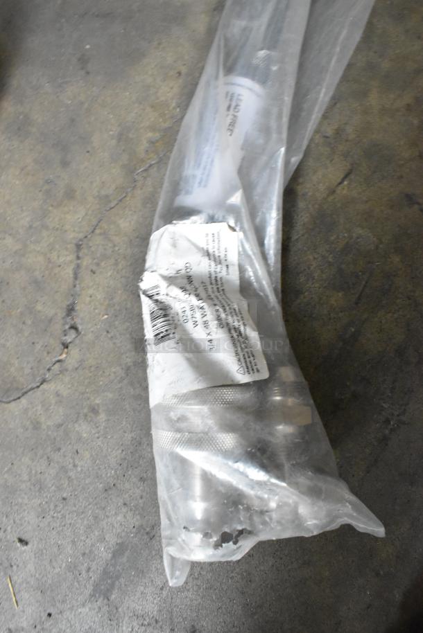 Brand new Dormont W75BP2Q60 water connector hose, 60" x 3/4", Hi-PSI coated, with 2-way quick disconnect, in packaging.