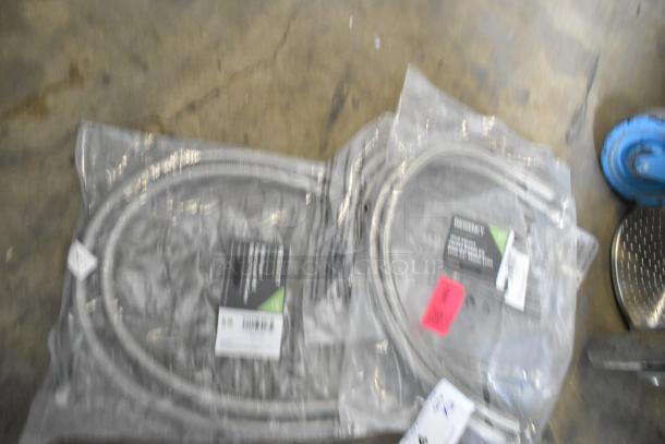 2 brand new Regency 600FIK12NPT24HOSEKIT water hoses in packaging with labels visible, ready for auction.