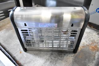Brand new Zap n Trap Bug Zapper, 120 Volts, 1 Phase, stainless steel, protective grille, indoor use warning label.