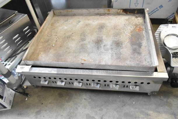 Vulcan Hart VCOB36 stainless steel countertop charbroiler grill, natural gas, six control knobs, worn surface.
