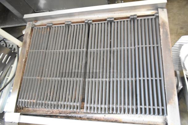 Vulcan Hart VCOB36 stainless steel charbroiler grill, natural gas powered, used condition, visible grates, commercial grade.