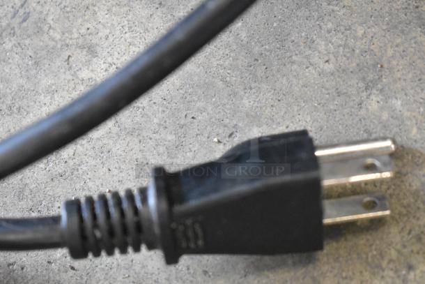 Close-up of a power plug for the Avantco 177SL312 metal commercial countertop meat slicer, 115 volts, 1 phase.