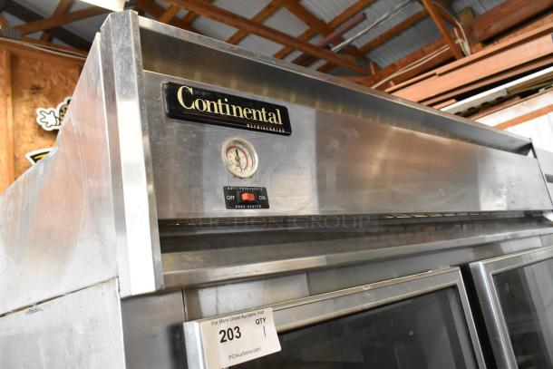 Continental 2RE-GD metal commercial 2-door reach-in cooler on casters. Features anti-condensate door heater.