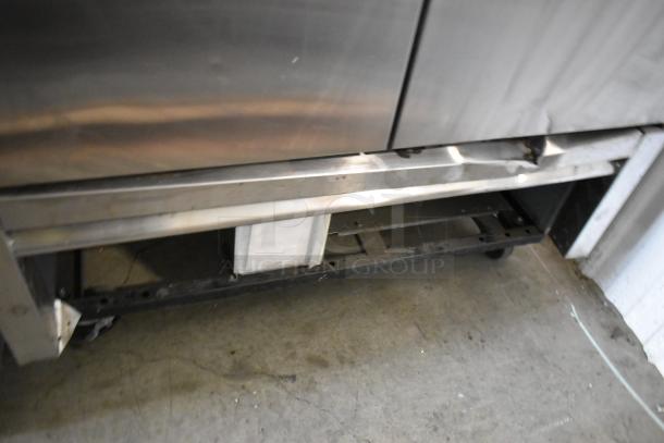 2021 True T-35-HC stainless steel 2-door reach-in cooler on commercial casters, 115 volts, 1 phase.