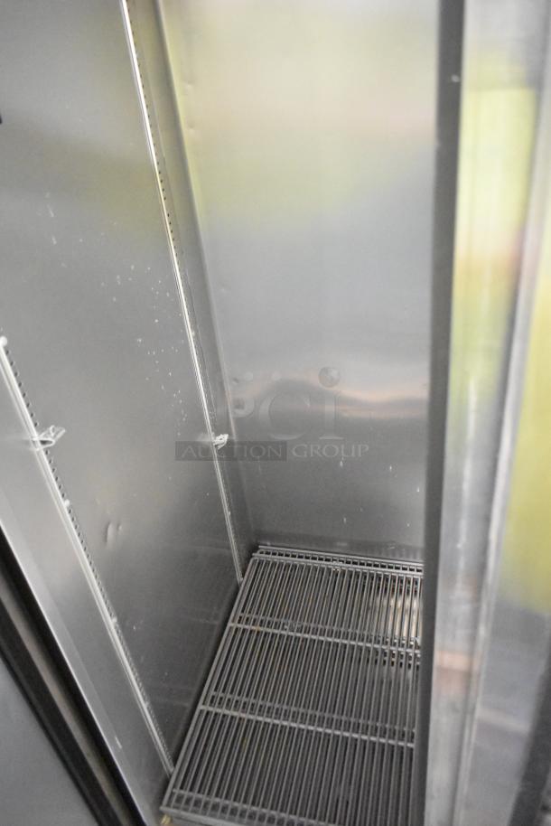 2021 True T-35-HC stainless steel commercial cooler interior, 2 doors, on commercial casters, 115V, excellent condition.