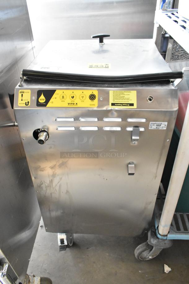 Vito XM stainless steel commercial mobile oil filtration system on casters. Features 120 volts, 1 phase. Visible control labels.