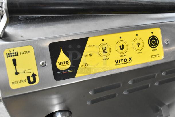 Vito XM stainless steel mobile oil filtration system, 120 volts, on commercial casters. Control panel shows filter and power settings.