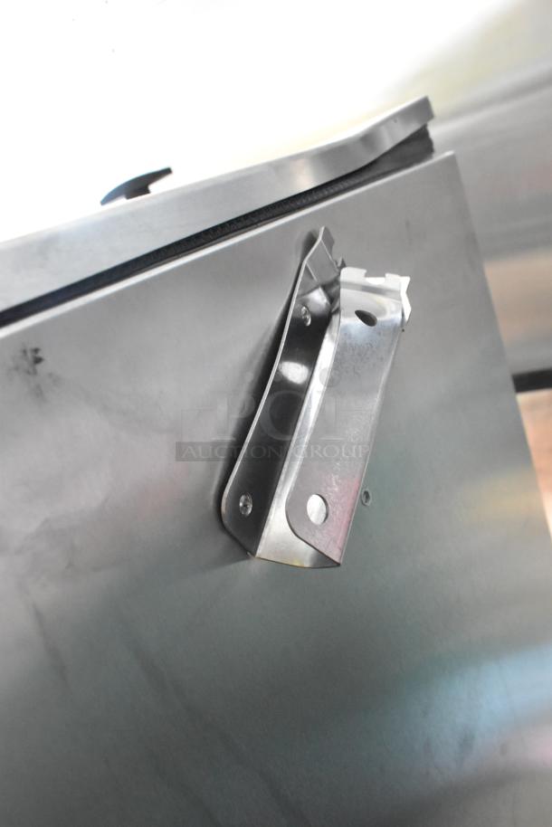 Stainless steel component of Vito XM Mobile Oil Filtration System, showing sturdy construction and metal bracket detail.