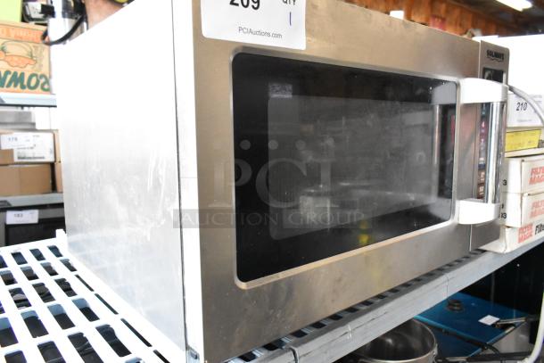 2022 Solwave 180MW112T stainless steel commercial countertop microwave oven, 120V, 1 phase, visible auction sticker.