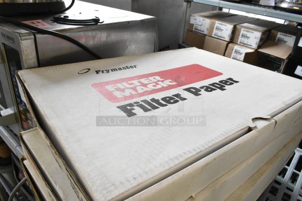 4 boxes of Frymaster Filter Magic 8030003 filter paper, unopened, displaying brand label and logo.