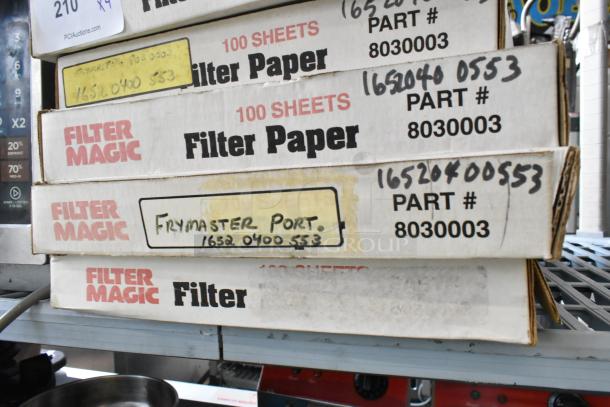 Four boxes of Filter Magic 8030003 filter paper, each containing 100 sheets, in their original packaging.