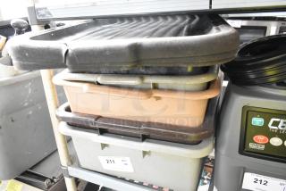 Lot of 8 poly items, including bus bins and lids. Various colors, visible wear. Auction label: "211 QTY".