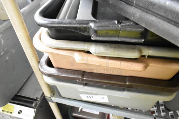 Set of 8 assorted poly bus bins, varying colors, stacked on a shelf. Used condition with visible wear. Auction tag "211."