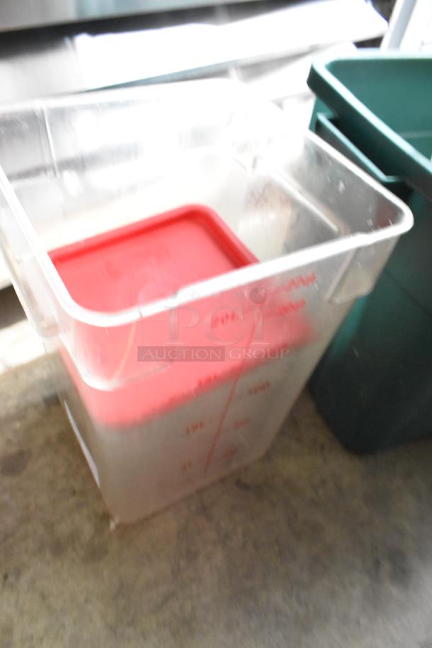 Poly bin with red lid, visible capacity markers, part of a mixed tier lot including utensils and drop-in bins.