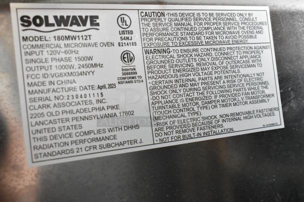 2023 Solwave 180MW112T stainless steel commercial microwave label showing model, serial number, and specifications.