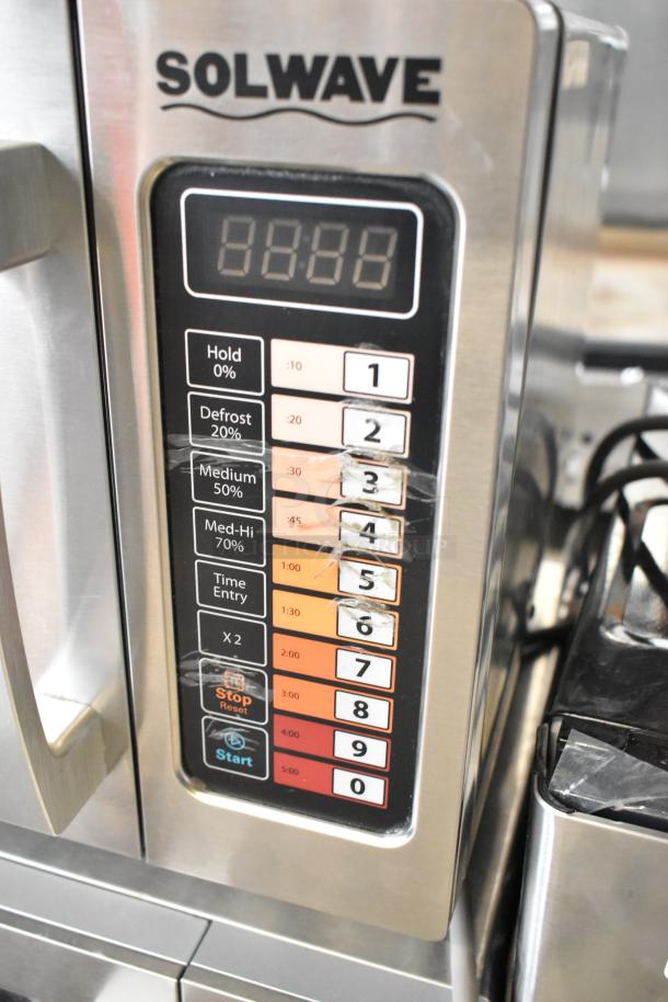 Brand new 2023 Solwave 180MW1000SS stainless steel commercial microwave with push button controls, 120V, minor scratches.