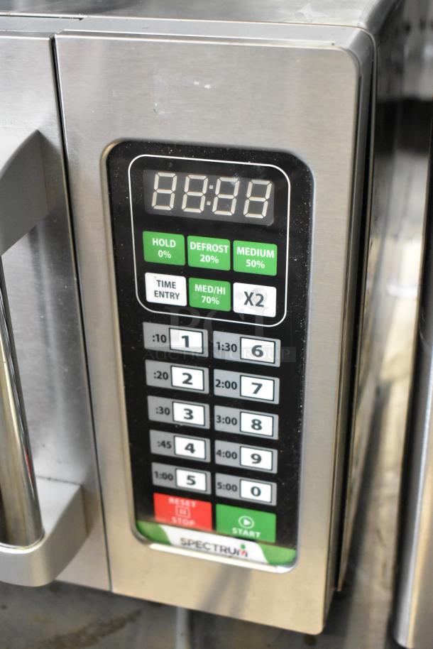 Winco Spectrum EMW-1000ST stainless steel commercial microwave with push button controls, 120 volts, scratch and dent.
