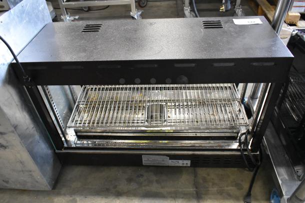 2023 Avantco 177HDC36 metal countertop heated display case, missing glass. 120V, 1 phase. Grills and power cord shown.