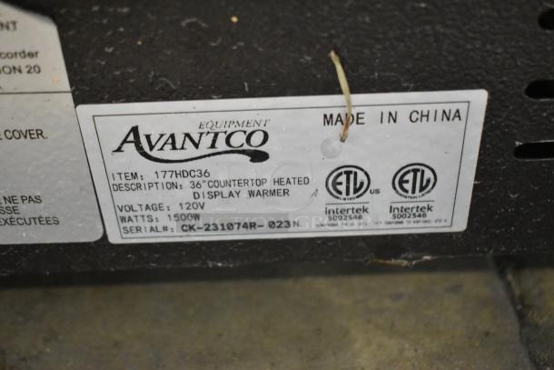2023 Avantco 177HDC36 metal countertop heated display case, missing glass, 120V, 1 phase, visible label details.