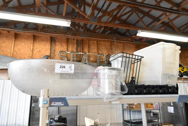 ALL ONE MONEY! tier lot with a textured poly bowl, beverage dispensers, and a metal rack. Auction tag reads "226 QTY Tier 10+".