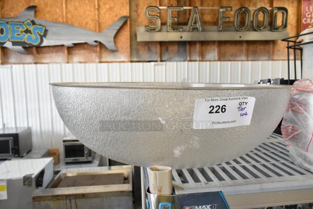 Poly bowl with a textured surface, part of a tier lot. Label marked "226 QTY Tier 104." Used condition, auction display.