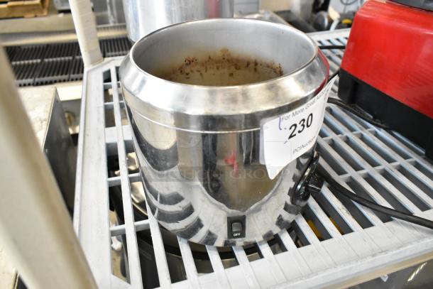 Server FS-2 stainless steel countertop food warmer, 120 volts, 1 phase. Visible wear inside, power switch on front. Auction tag 230.