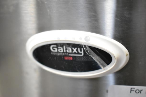 Galaxy 177RWG90 stainless steel electric rice cooker, 120V, countertop model. Features a visible Galaxy logo on the body.