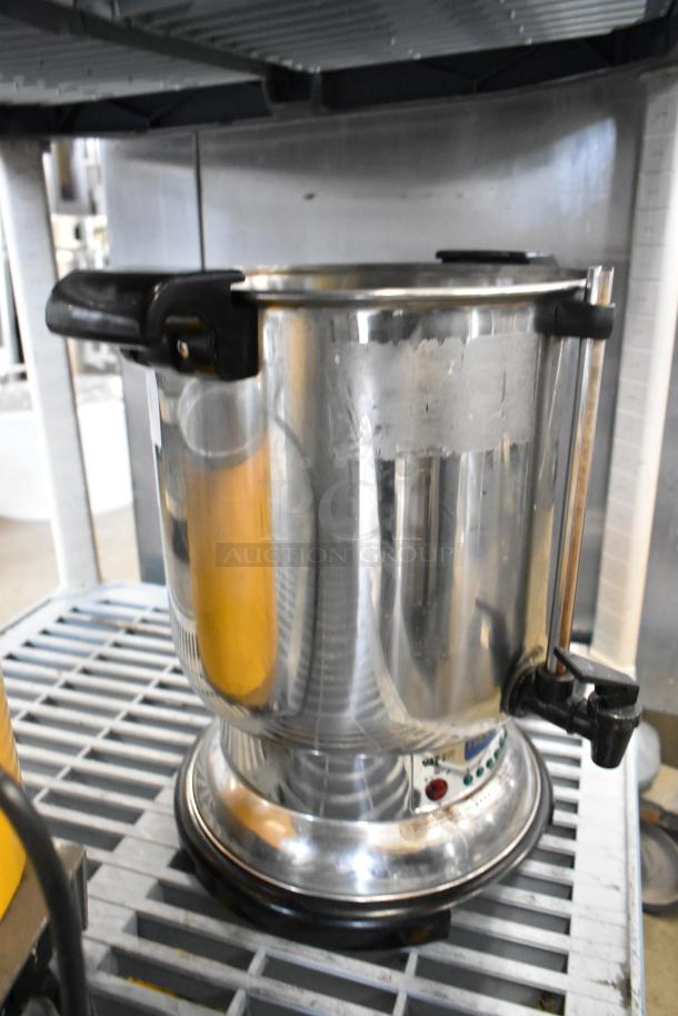 DeLonghi DCU72 metal countertop coffee maker, no lid, 120V, 1 phase; good condition, visible control panel.