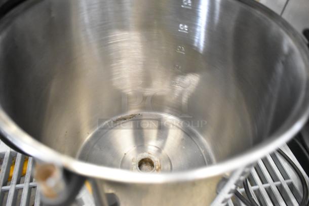 DeLonghi DCU72 metal coffee maker, no lid, showing the interior. Used condition with some residue visible. 120 volts, 1 phase.