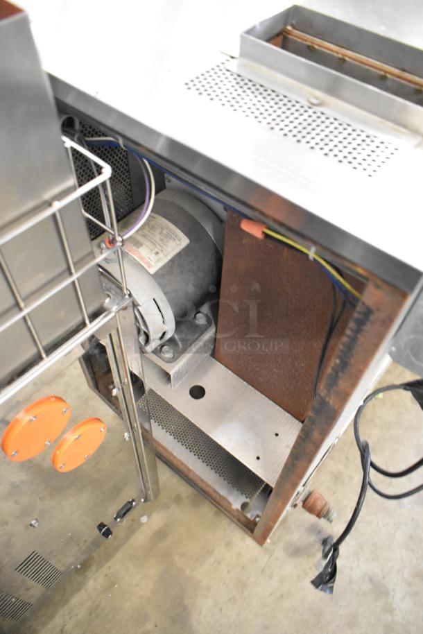 Blodgett stainless steel half-size convection oven with view-through door, metal racks, and thermostatic controls. Gas-powered.