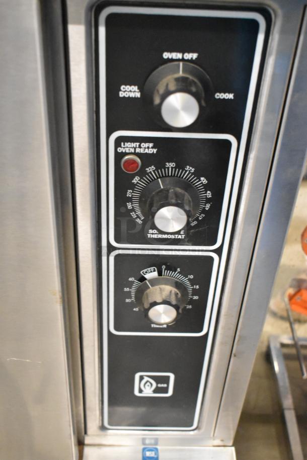 Blodgett stainless steel half-size convection oven, gas-powered, featuring view-through door, metal racks, thermostatic controls.
