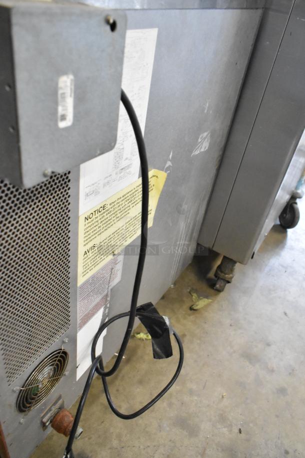 Blodgett stainless steel gas convection oven, half-size, view-through door, metal racks, thermostatic controls, used condition.