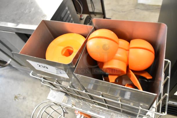 Vevor 2000EH citrus juicer with visible orange parts, stainless steel build, and auction tag, in good condition.
