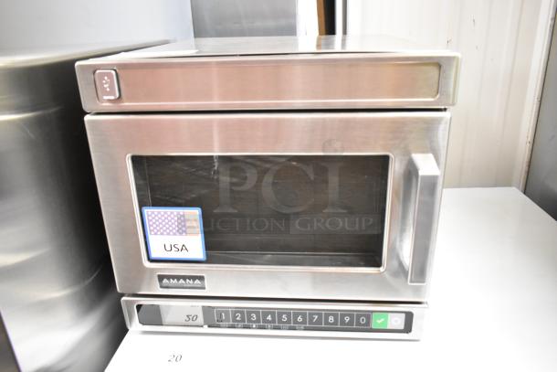 2025 Amana HDC10Y15 stainless steel commercial microwave, compact with push-button controls, 120V, USA label visible.