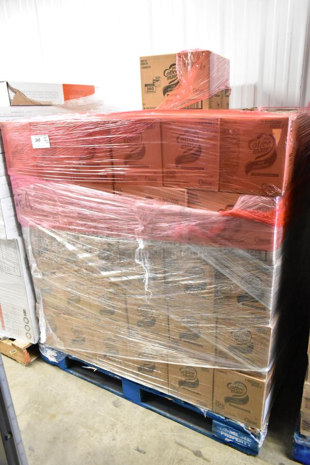 103 boxes of Coffee Mate creamers, each containing 360 units. New, shrink-wrapped on a pallet, packaging intact.