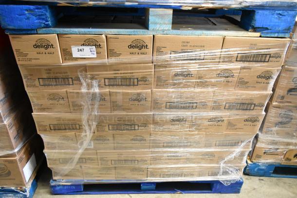 140 boxes of International Delight Half & Half Coffee Creamers on pallet; labeled and shrink-wrapped, brand new condition.