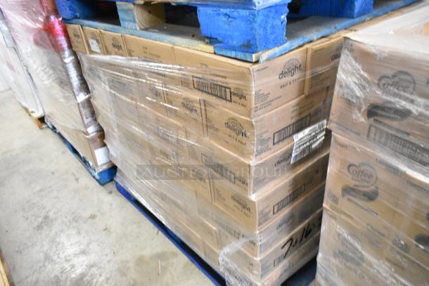 140 sealed boxes of Delight Half & Half Coffee Creamers on pallets, brand new.