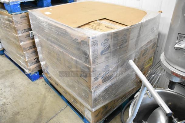 80 boxes of Coffee Mate creamers on a pallet, wrapped in plastic, brand new condition, ready for auction.