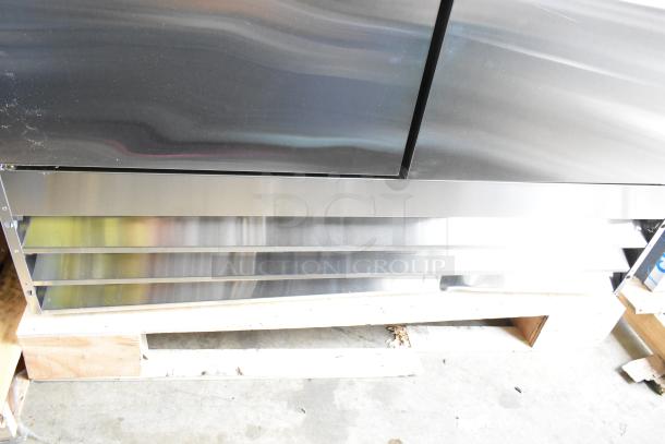 Brand new Avantco 178A49FHC 54" stainless steel reach-in freezer with visible scratches and dents. 115V, 1 phase.