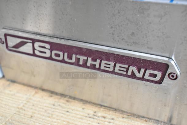 Close-up of the Southbend logo on a stainless steel 36" S361D natural gas range, new with minor scratches.