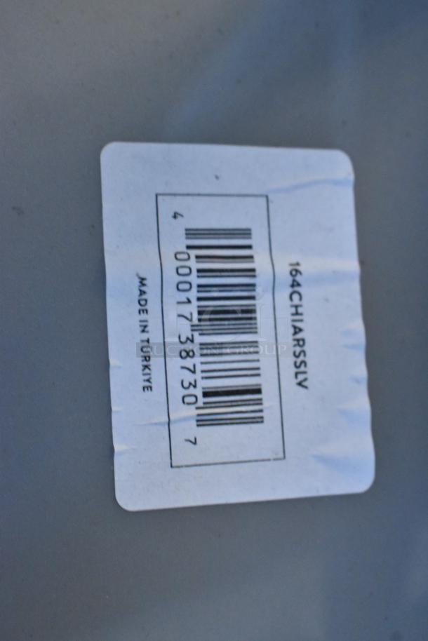 Silver Lancaster Chiavari chair tag with model number 164CHIARSSLV, indicating new scratch and dent condition, made in Türkiye.