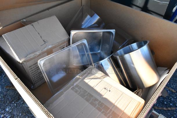Pallet of mixed items including stainless steel drop-in bins and 2.25" white ramekins, some items in original boxes.