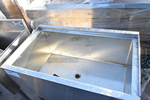 Krowne stainless steel commercial ice bin with commercial casters, features durable construction, good condition.