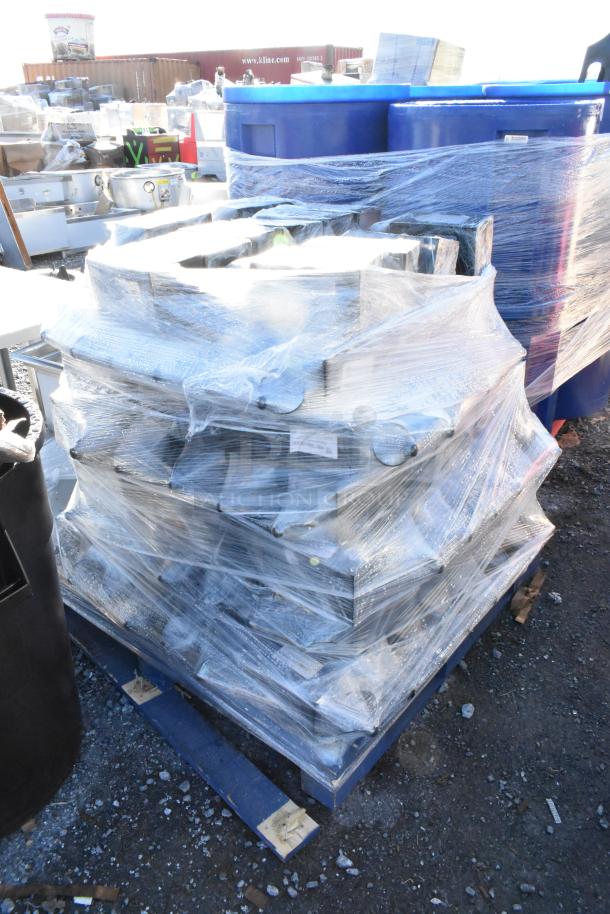 Pallet of 100 black wrought iron metal lanterns, wrapped in plastic, in new condition, ready for auction.