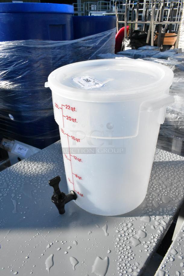 Brand new 22-quart clear poly beverage dispenser with tap, marked for measurements. Scratch and dent, lid included.